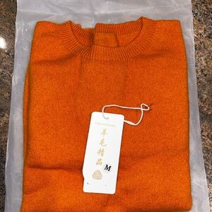 Elegant Orange Women's Crew Neck Sweater